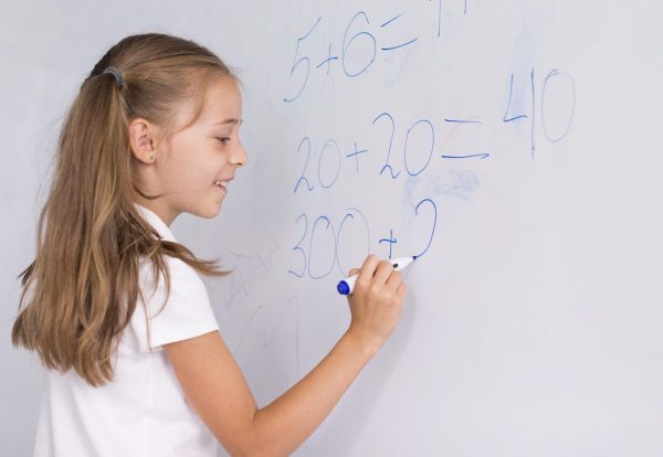 girl-doing-math-whiteboard